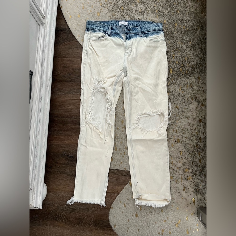 White and denim distressed jeans